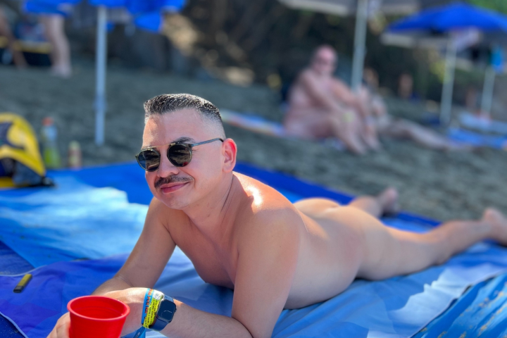 a person sitting at a beach