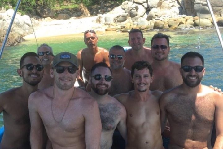 a group of people posing for the camera