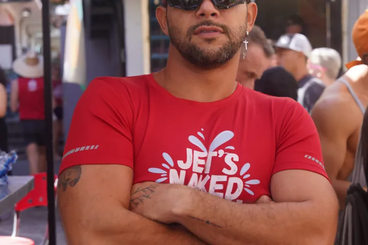 a man standing in front of a store