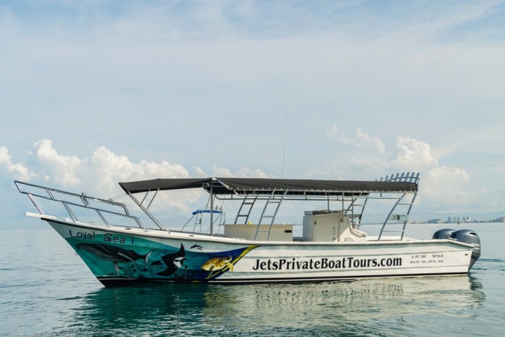a small boat in a body of water