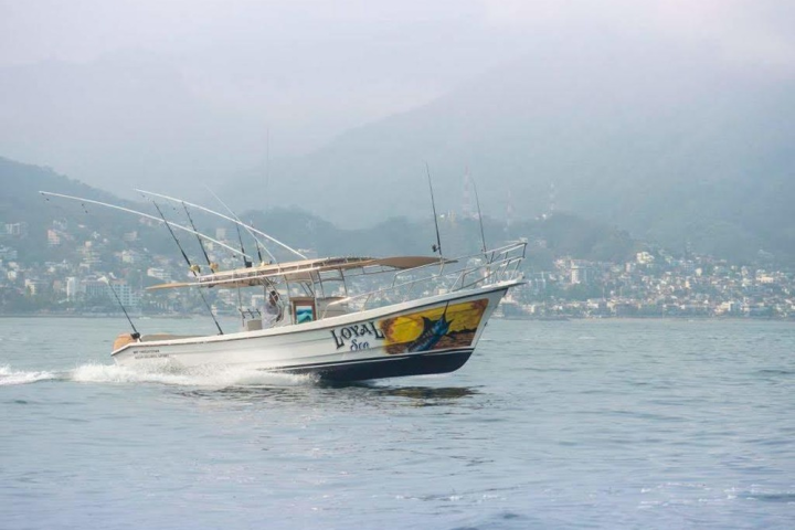 a small boat in a body of water