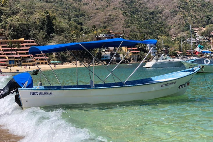 a small boat in a body of water