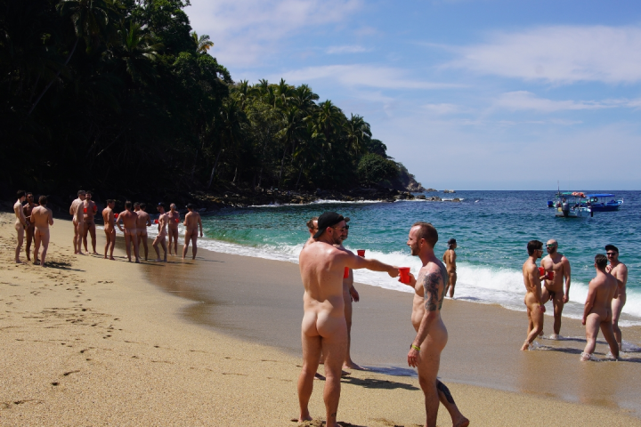 a group of people on a beach